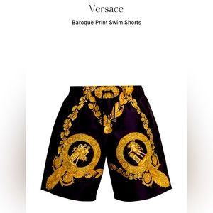 A baroque graphic print enriches these Versace swim shorts.